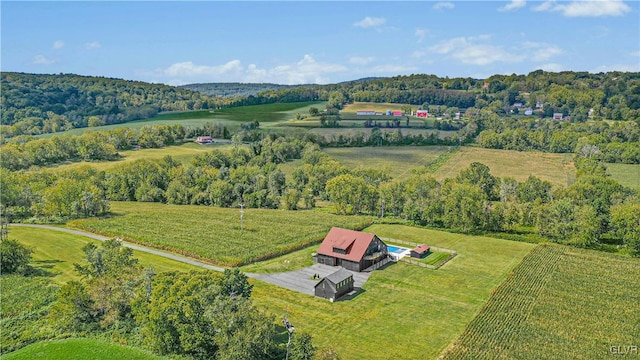 birds eye view of property featuring a rural view