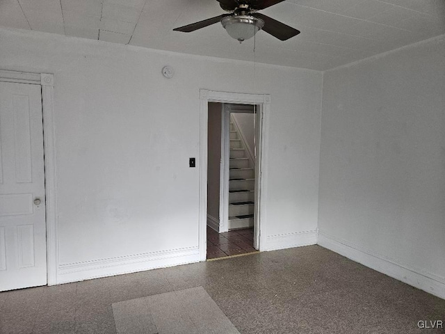 unfurnished room featuring ceiling fan