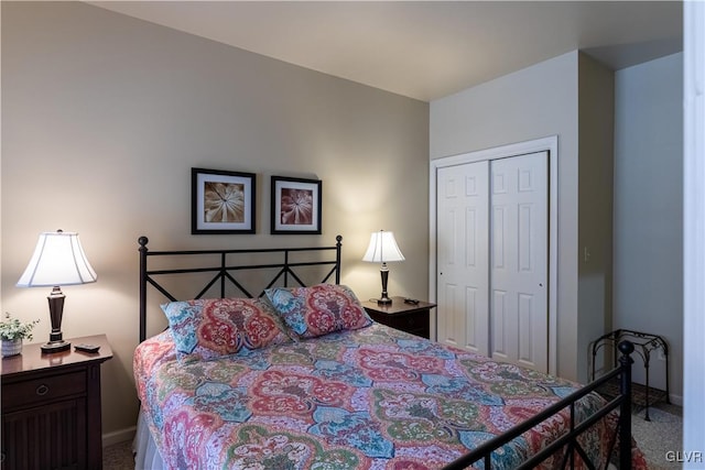 carpeted bedroom with a closet