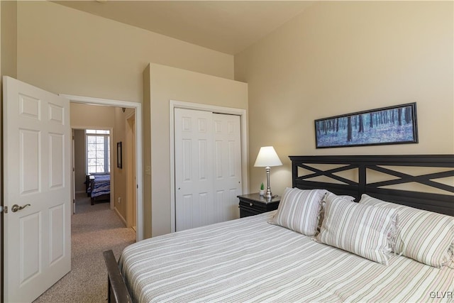 bedroom with a closet and carpet