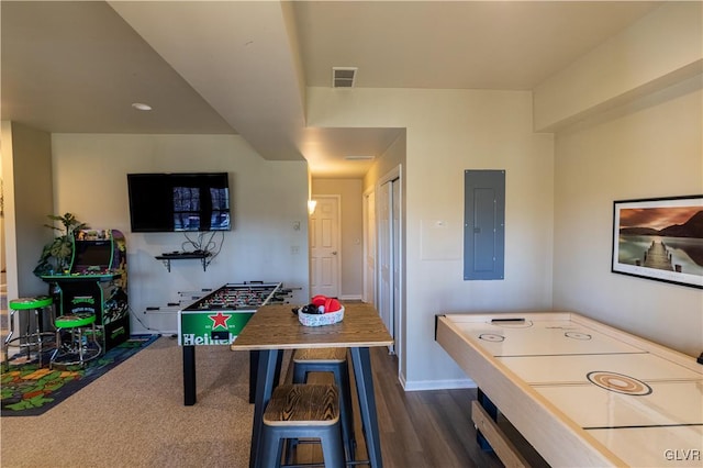 playroom featuring electric panel and dark hardwood / wood-style floors