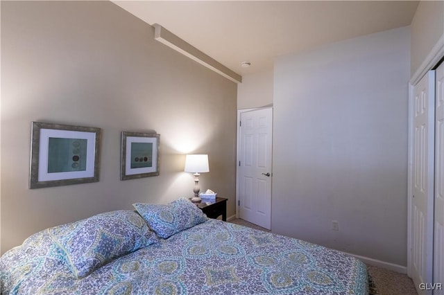 bedroom featuring a closet and carpet flooring