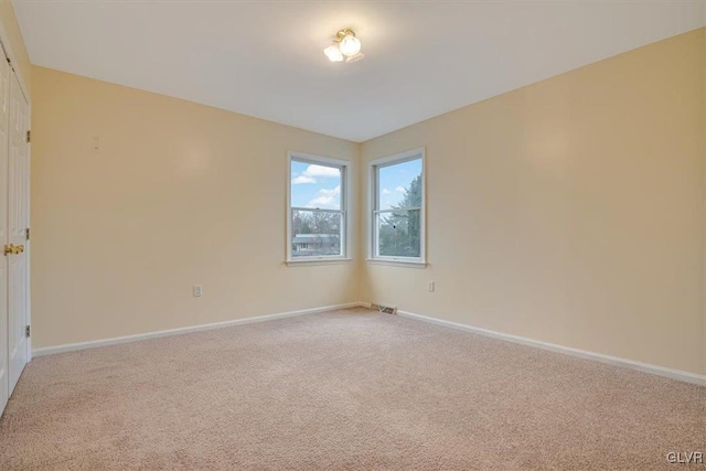 view of carpeted spare room