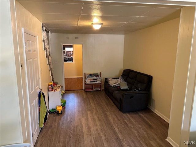 sitting room with dark hardwood / wood-style floors