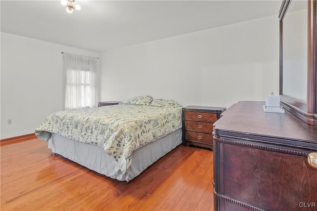 bedroom featuring wood-type flooring