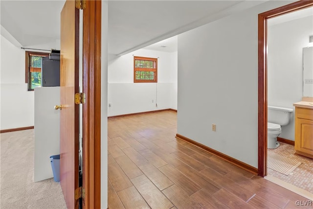 corridor featuring light hardwood / wood-style flooring