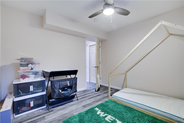 interior space featuring hardwood / wood-style floors and ceiling fan