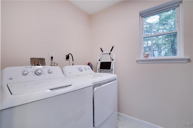 laundry area featuring separate washer and dryer