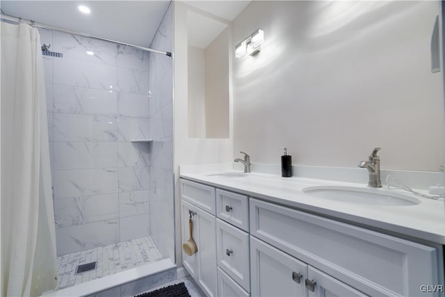 bathroom with vanity and curtained shower