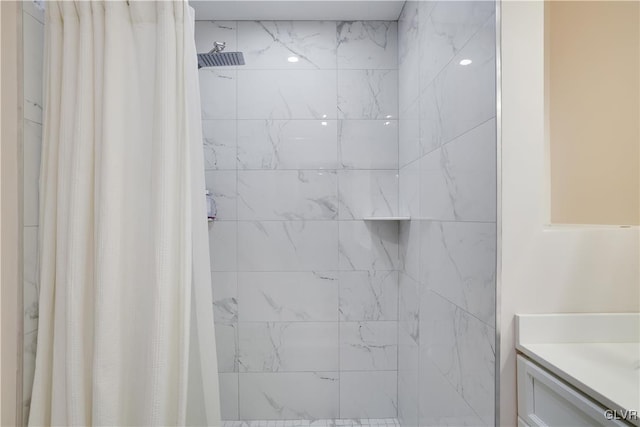 bathroom with vanity and curtained shower