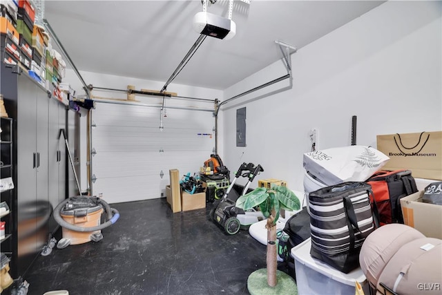 garage featuring a garage door opener and electric panel