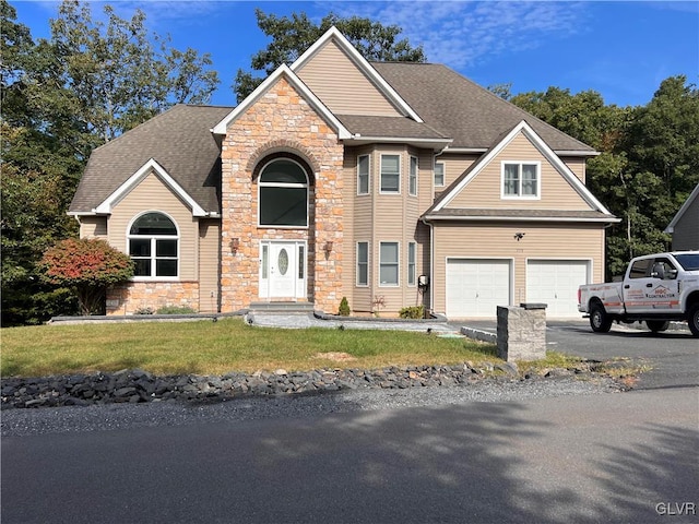 front of property with a garage