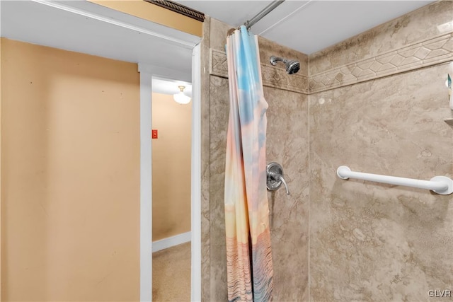 bathroom featuring curtained shower