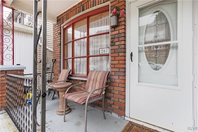 doorway to property with a porch