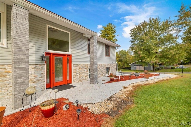 exterior space with a lawn and a patio area