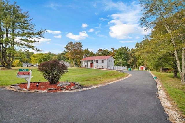 view of front of house with a front lawn