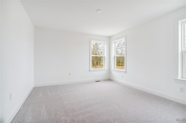 view of carpeted spare room