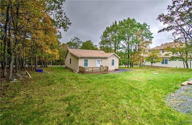 view of yard featuring a deck