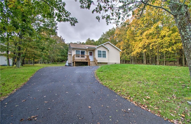 view of front of home with a front lawn