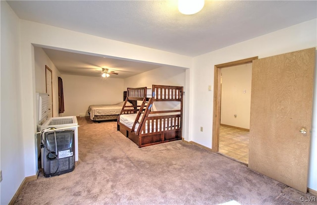 bedroom featuring light colored carpet