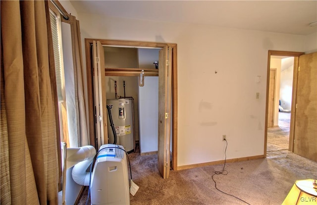 interior space featuring carpet and water heater