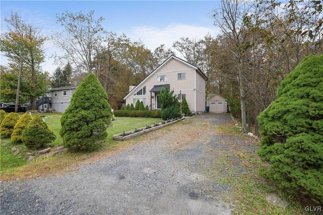 view of side of home featuring a yard