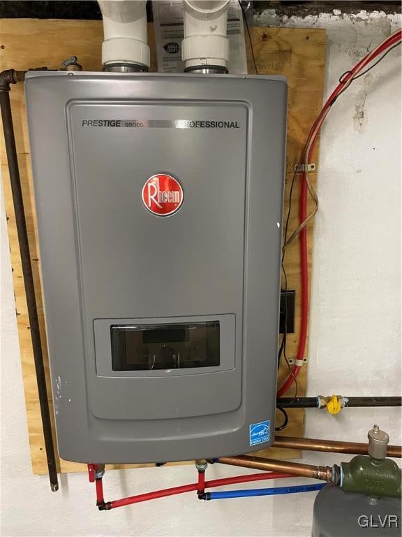 utility room with water heater