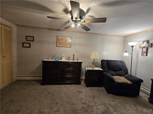 living area featuring carpet floors, crown molding, a baseboard heating unit, and ceiling fan