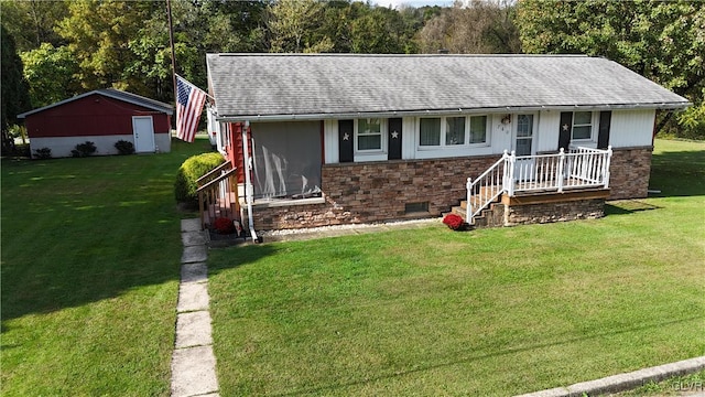 single story home with a front yard