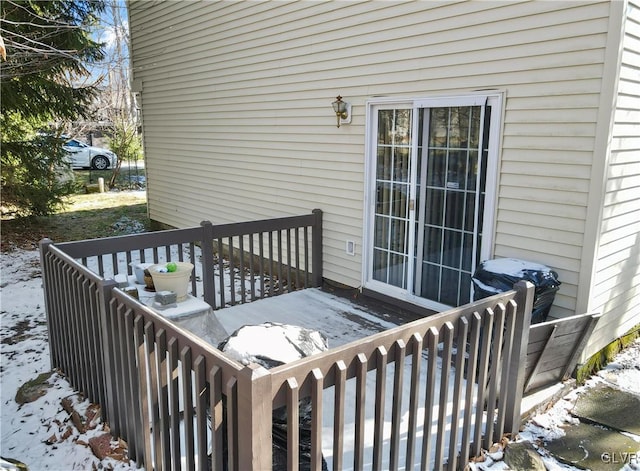 view of snow covered deck