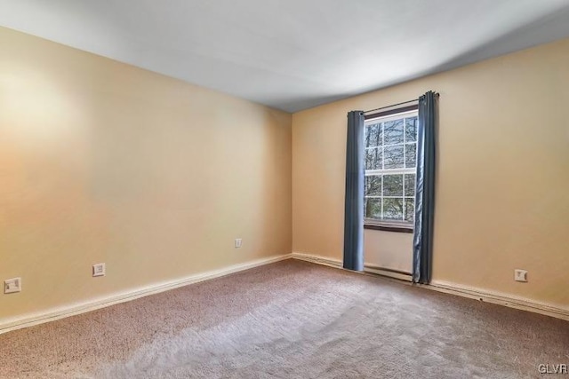 view of carpeted spare room