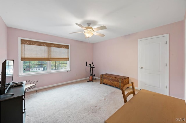 interior space with ceiling fan and carpet floors