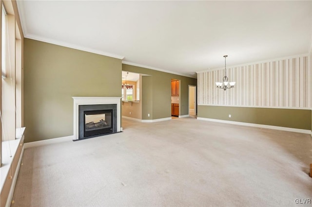 unfurnished living room with a multi sided fireplace, light colored carpet, ornamental molding, and a notable chandelier