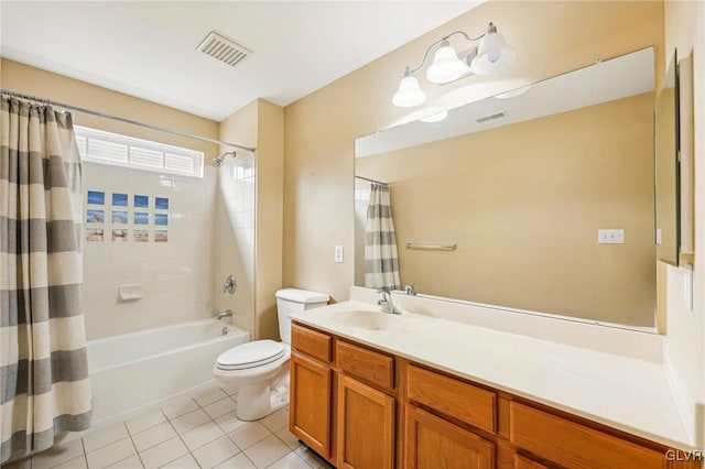 full bathroom with tile patterned floors, vanity, toilet, and shower / bath combination with curtain