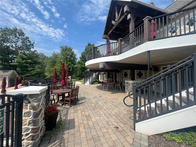 view of patio with an outdoor bar