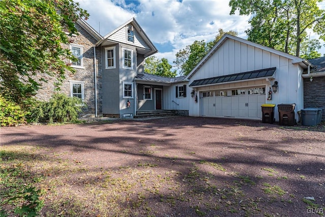 view of front of property with a garage