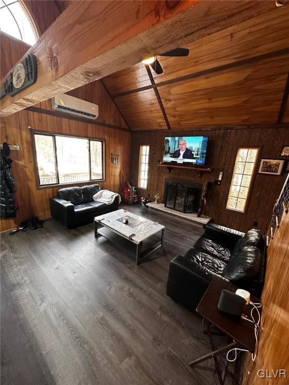 unfurnished living room featuring wooden ceiling, a wall mounted AC, hardwood / wood-style floors, lofted ceiling, and wooden walls