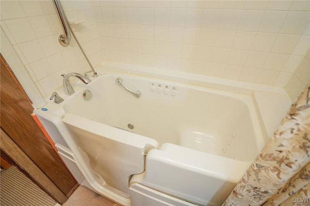 bathroom featuring a tub