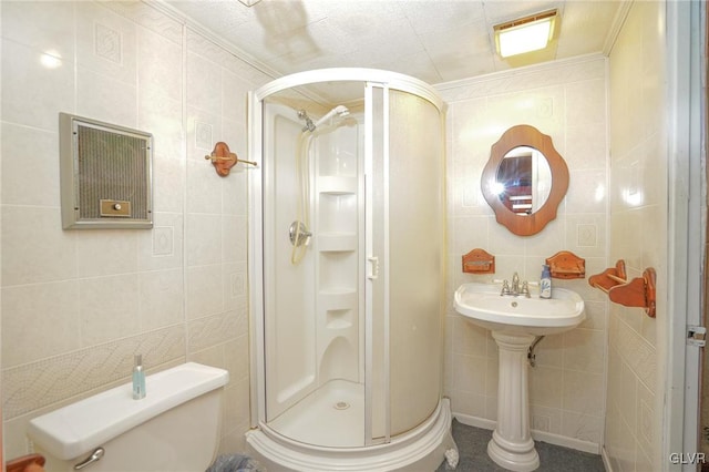 bathroom featuring walk in shower, tile walls, ornamental molding, and toilet