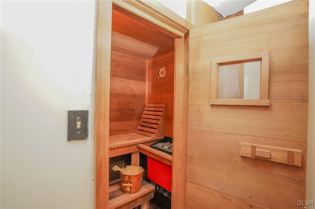 view of sauna / steam room with wooden walls