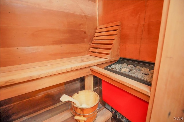 view of sauna featuring wood walls and hardwood / wood-style floors