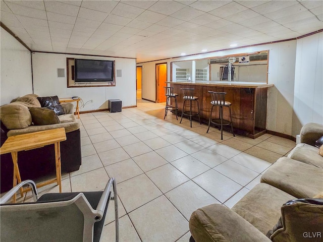 tiled living room with indoor bar