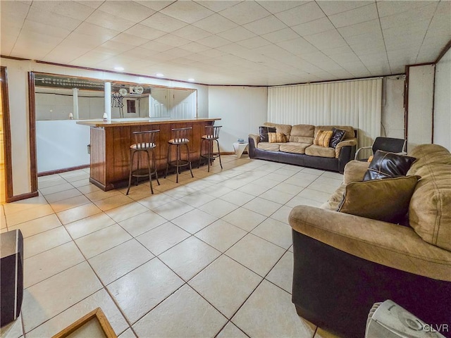 tiled living room with indoor bar