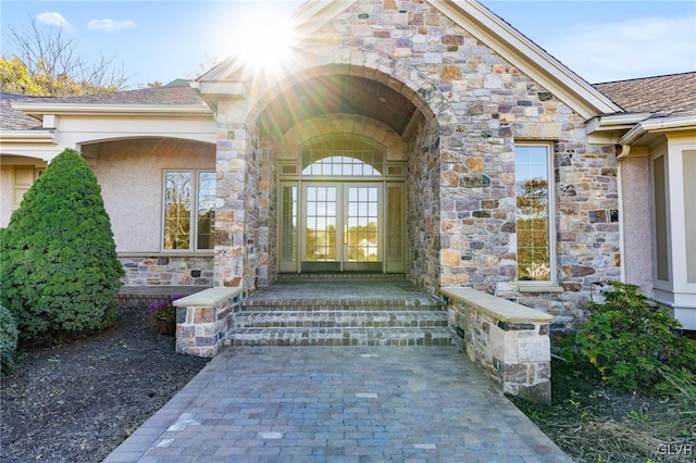 property entrance featuring french doors