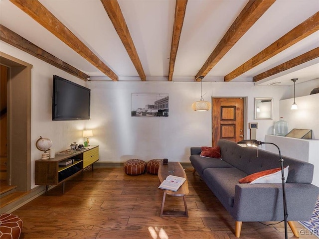 living room featuring beam ceiling and dark hardwood / wood-style floors