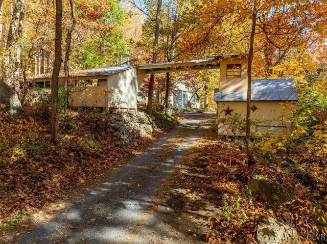 exterior space featuring a carport