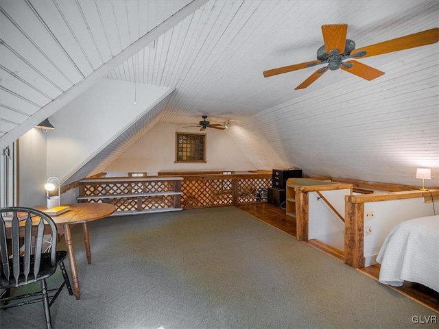 bonus room with ceiling fan, carpet floors, and lofted ceiling