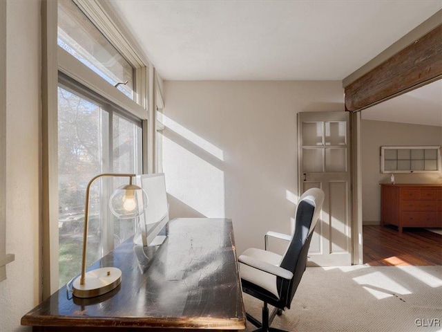 office featuring wood-type flooring and lofted ceiling