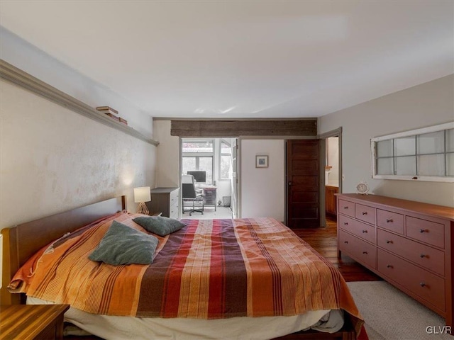 bedroom featuring wood-type flooring