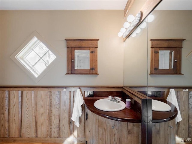 bathroom with vanity and a skylight